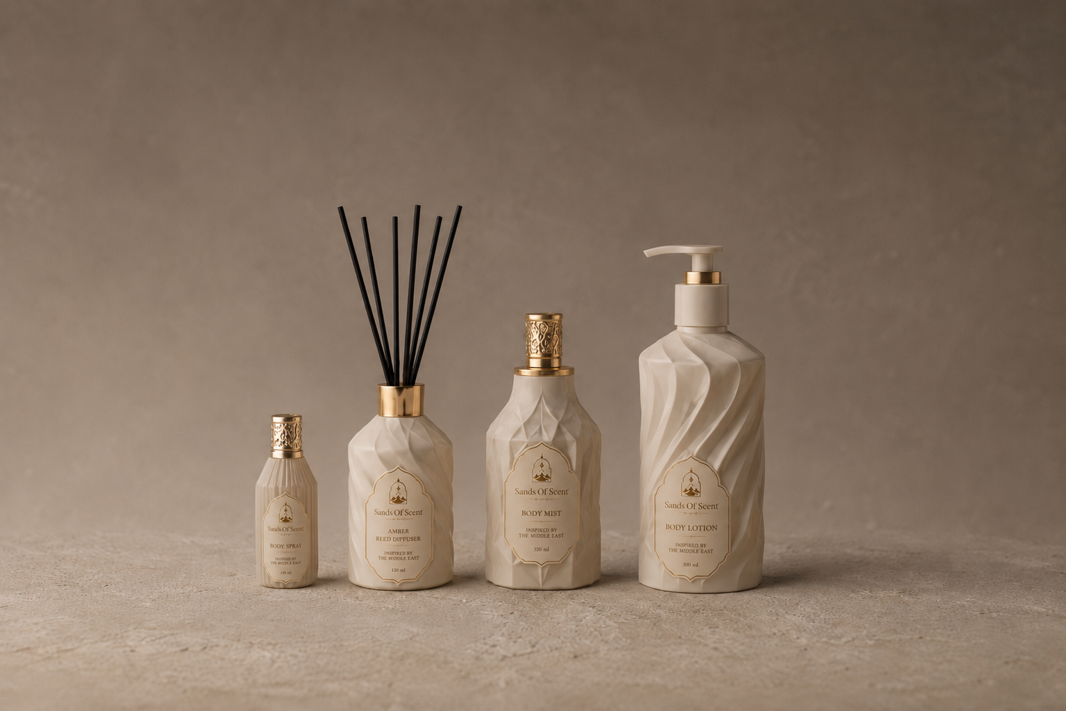 Four Sands of Scent products styled together in a warm neutral setting